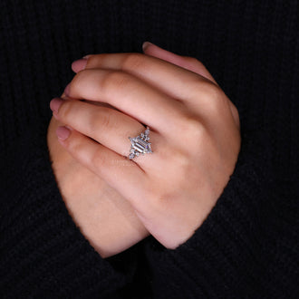 Handcrafted elongated hexagon engagement ring.