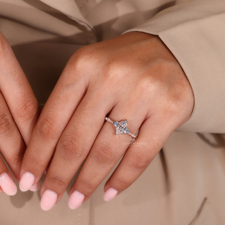 Cyan Blue Diamond set in a handcrafted V prong setting, enhancing its brilliance.