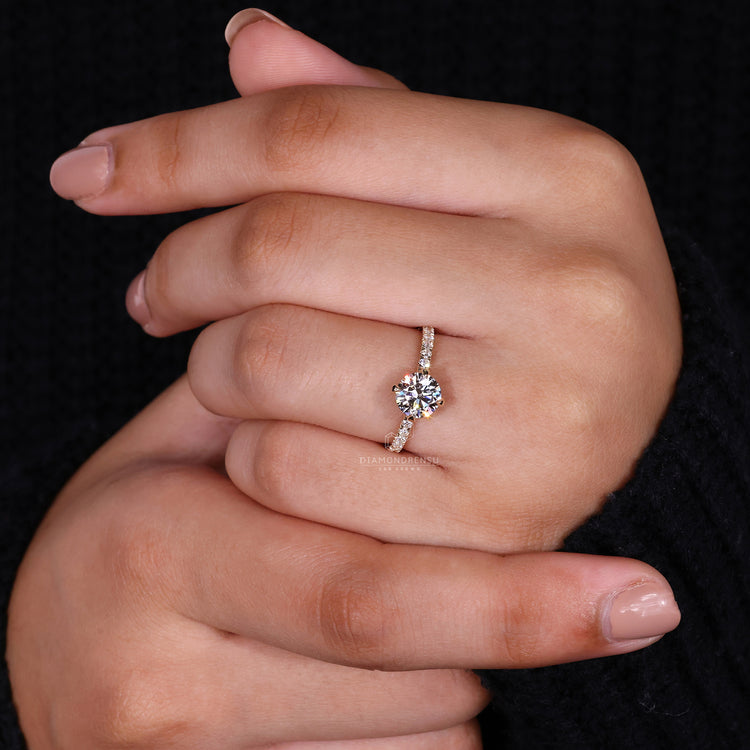Prong Setting Ring with a round cut diamond for lasting brilliance.