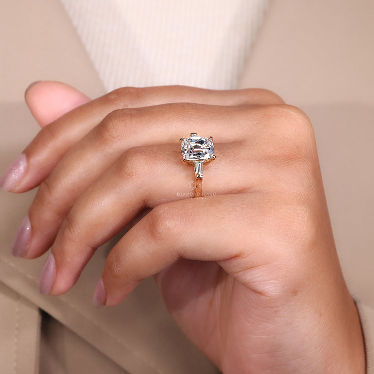 4 prong claw setting for a cushion cut diamond, designed to securely hold the diamond in place.