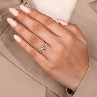 Handmade jewelry ring with heart shaped diamond and round cut pave.