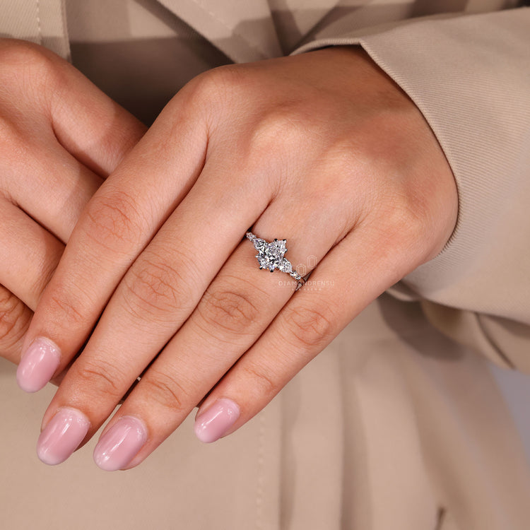 Five claw prong pear diamond ring.