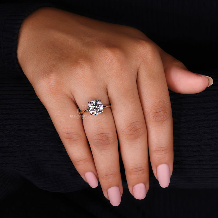 Solitaire Ring with a stunning round diamond centerpiece.