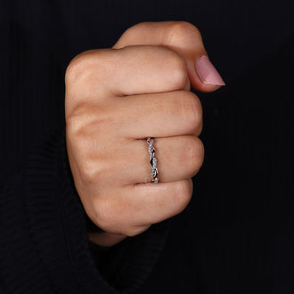 Custom diamond band with round cut stones.