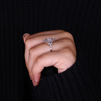 Side stones engagement ring in unique hexagon design.