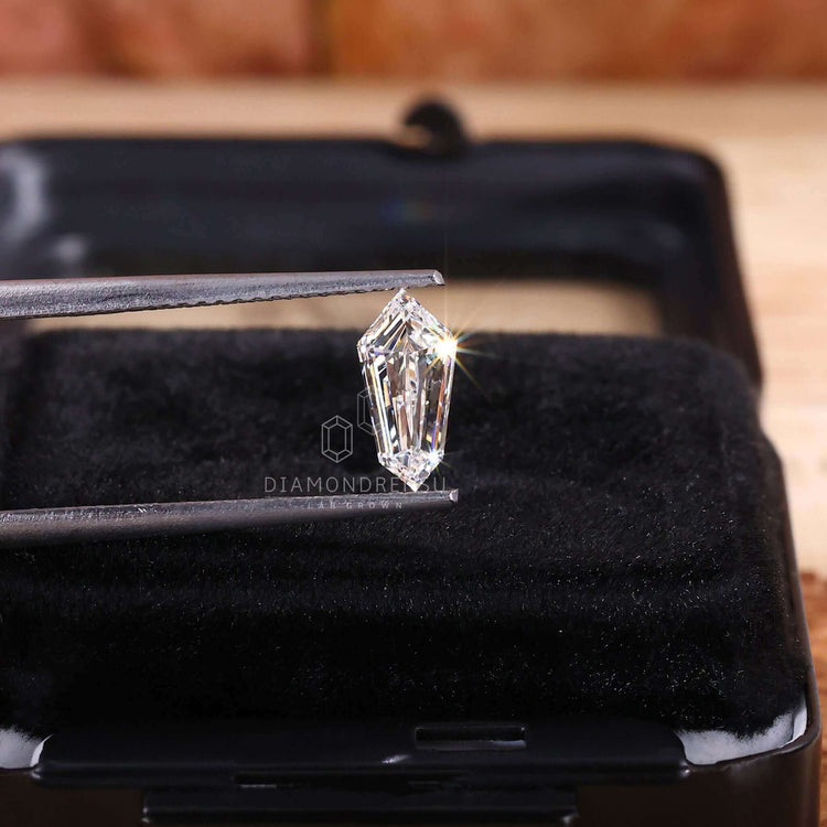 Diamondrensu loose stone listed in shield shape diamond with lab grown source.