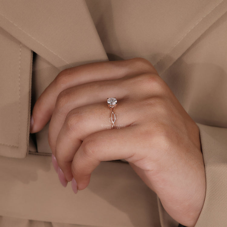 Round Diamond Ring in a beautiful rose gold solitaire setting.