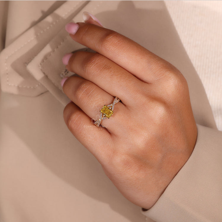 Round cut engagement ring with radiant cut diamond ring accents.