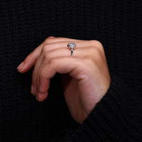 Marquise Side Stone Engagement Ring with sparkling accents.