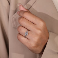 Round cut diamond set in a classic white gold diamond ring with a timeless design.