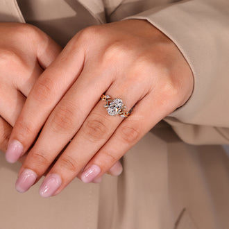 Four leaf style prong setting diamond ring.