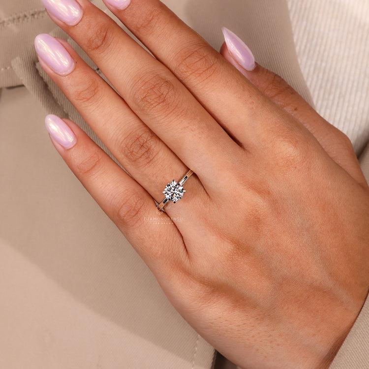 Handmade ring created with yellow gold engagement ring and four tab prong ring.