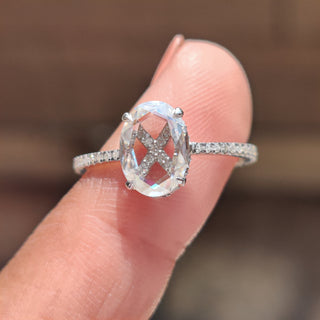 This oval rose cut engagement ring offers a unique, elegant design.