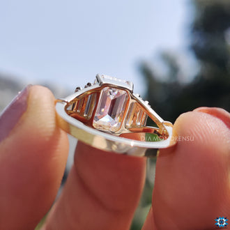 Custom moissanite ring with unique detailing.