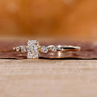 Custom Engagement Ring featuring radiant cut diamonds and round cut side stones.