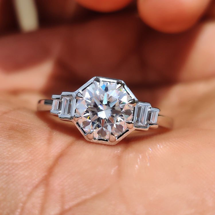 Round cut engagement ring with sparkling center moissanite.