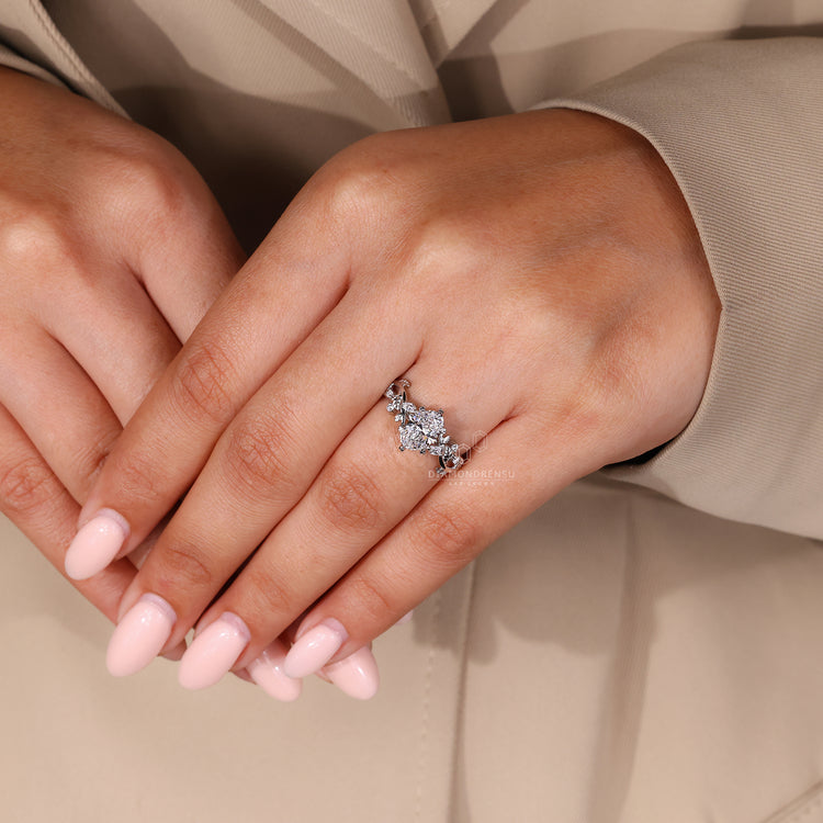 White gold engagement ring with nature-inspired structure.