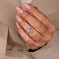 White gold engagement ring with IGI certified pear diamond.