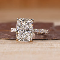 Buy engagement ring with elongated cushion and round cut pave band style.