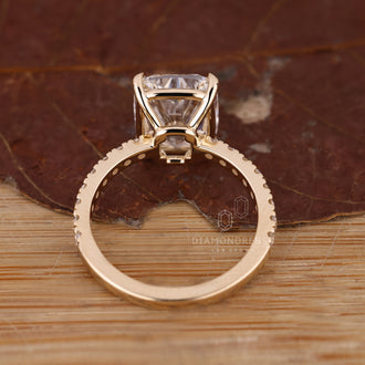 Pave setting ring on elongated cushion diamond available in every metal.