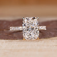 Handmade ring with elongated cushion and 4 claw prong setting.