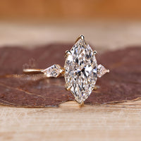 Tapered shank marquise diamond ring.