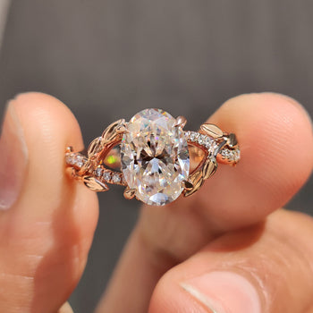 Nature inspired ring with moissanite oval stone.