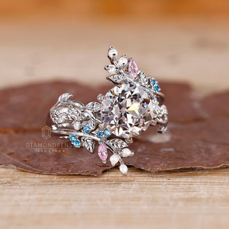 Pink marquise diamond band in a custom engagement ring.