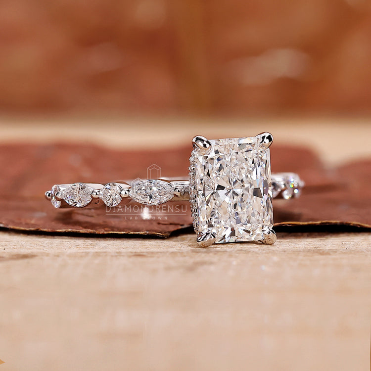 Pave Set Diamond Band adding extra brilliance to the design.
