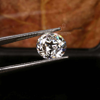 Old European cut round diamond used in custom heirloom-style bands.
