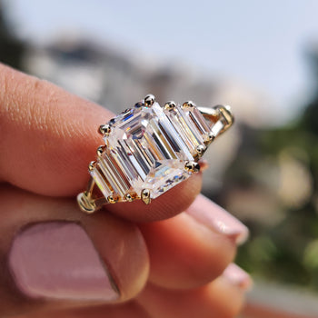 5 stone moissanite ring with elegant sparkle.