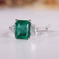 Tapered shank ring featuring Lab Grown Diamond center.