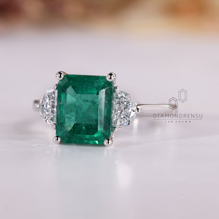 Tapered shank ring featuring Lab Grown Diamond center.