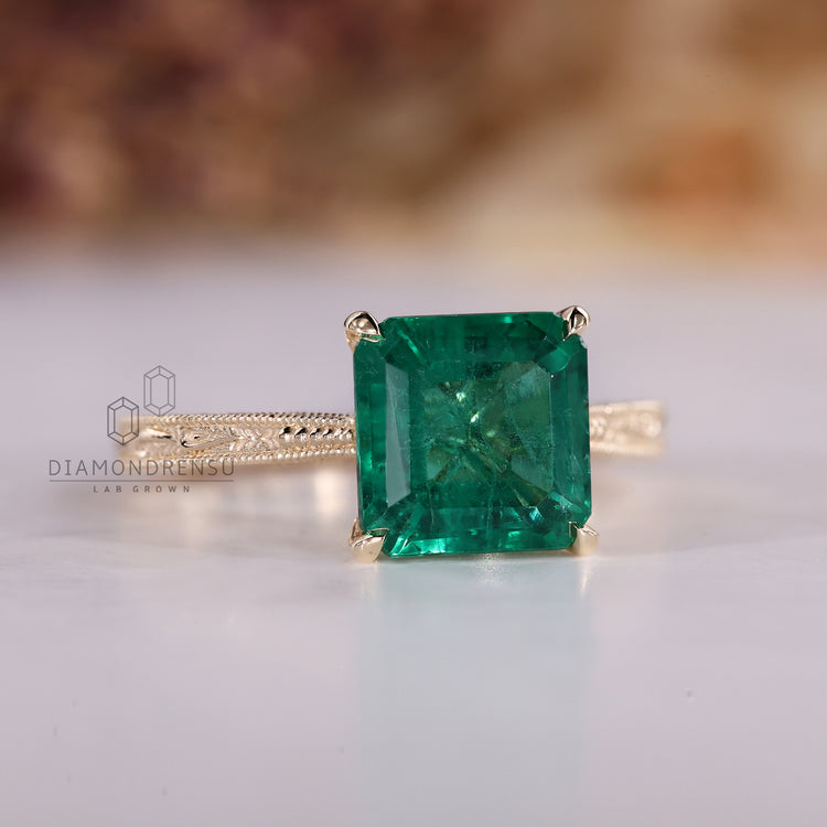 Four claw prong setting ring crafted in yellow gold.