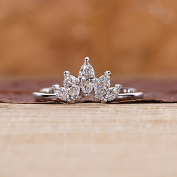 Marquise diamond wedding band with elegant sparkle.