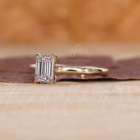 Cathedral setting ring with a raised diamond profile.