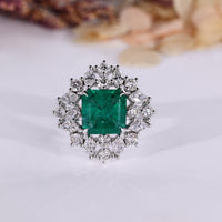 Vintage engagement ring with emerald gemstone.