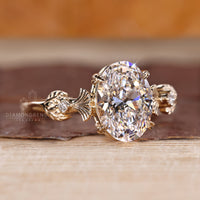 Handmade ring with vintage design and oval diamond centerpiece.
