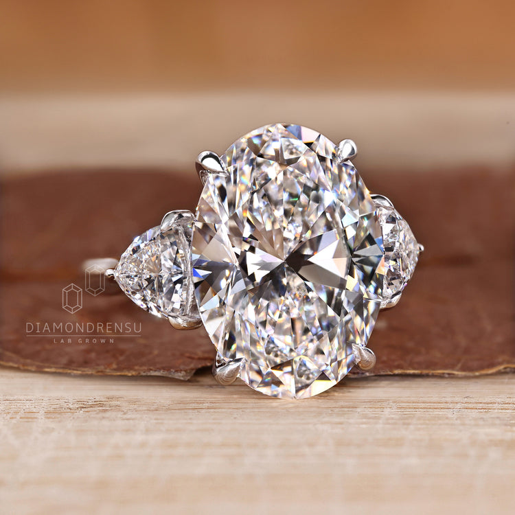 Custom diamond ring with three stone design.