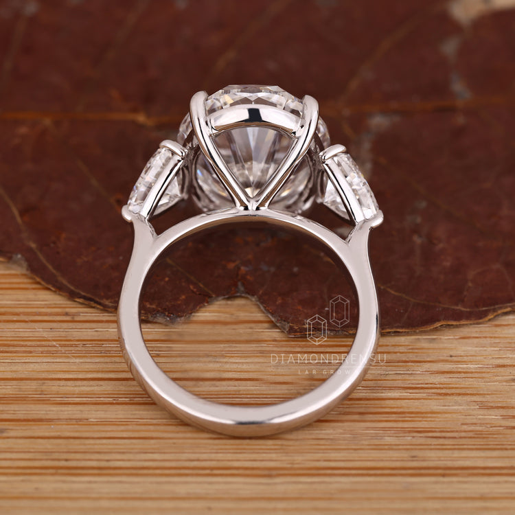 Handmade ring with oval and trillion diamonds.