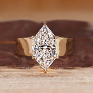 Dutch marquise engagement ring with solitaire diamond.
