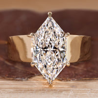 Dutch marquise engagement ring with solitaire diamond.