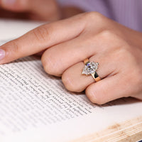 Solitaire setting ring featuring Old European cut diamond and handmade design.