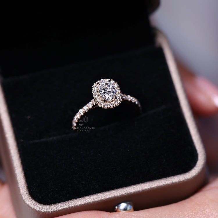 Handmade oval diamond engagement ring.