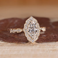 Marquise Diamond Ring With Round Halo And Vintage Inspired Design.