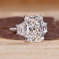 Buy engagement ring featuring a classic 3 stone ring design.