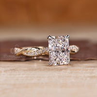 Handmade ring with two tone yellow and white gold and radiant cut diamond.