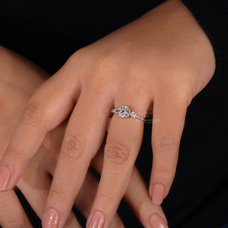 Emerald Engagement Ring with stunning emerald-cut stones.