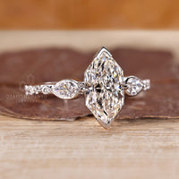Diamondrensu engagement ring with elegant art deco inspired details.