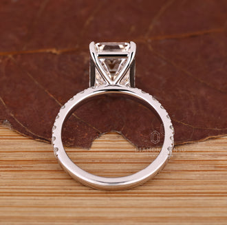 Handmade jewelry emerald cut diamond ring.